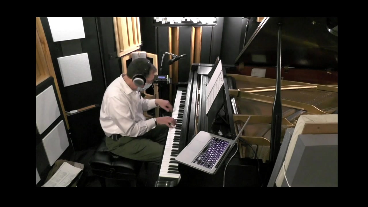 Phillip L. Pearl performing A Foggy Day at the piano